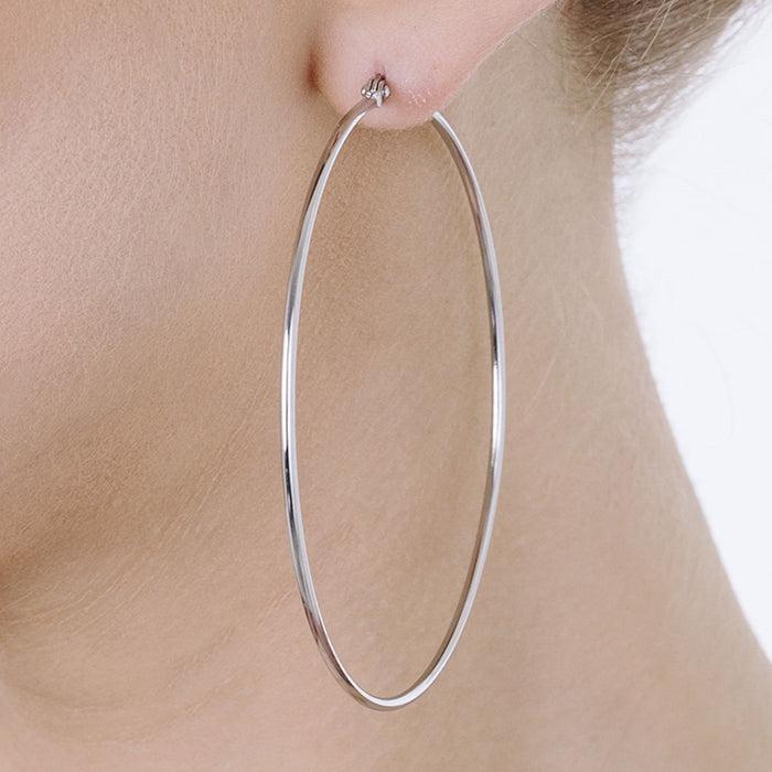 BOUCLES D'OREILLES CRÉOLES FEMME EN ACIER DIAMÈTRE 63 MM