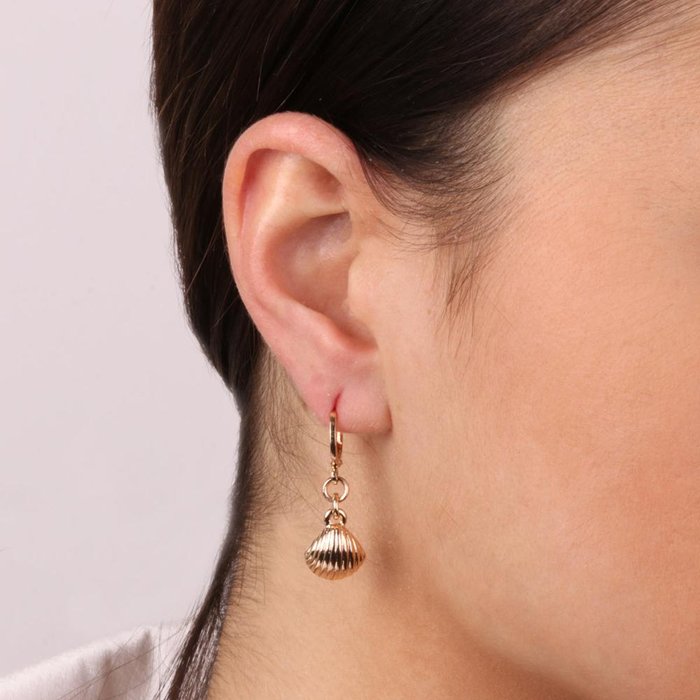 Metal earrings with shell pendant