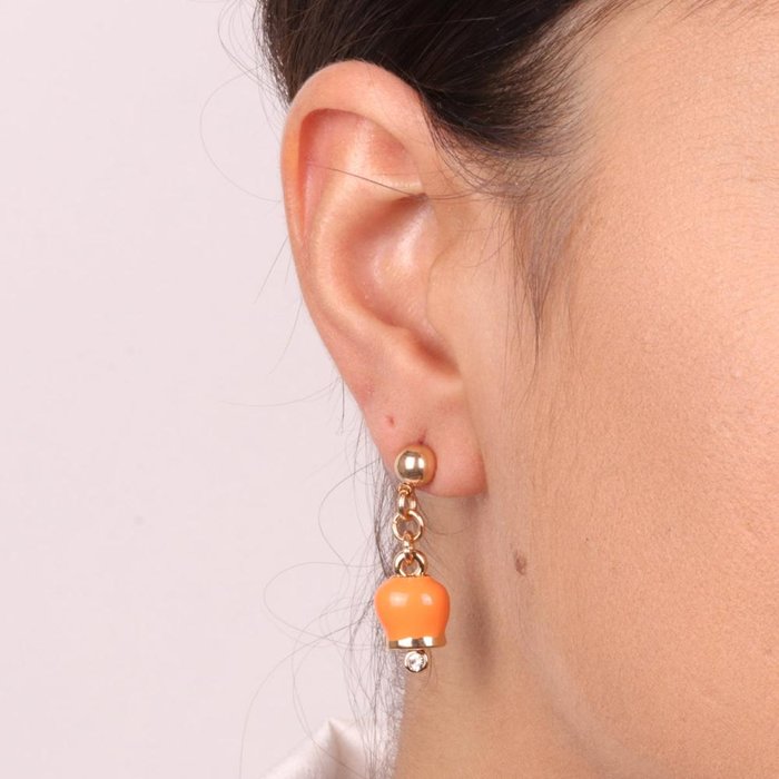 Metal earrings with orange enamel bell pendant