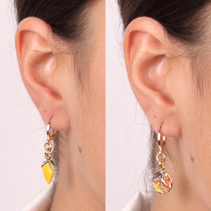 Metal earrings with trinacria and lemon