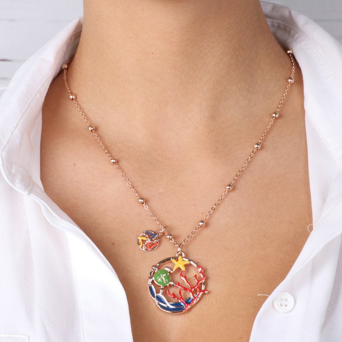 Metal necklace with pendant in marine style design, embellished with colored enamels and Sicilian trinacria