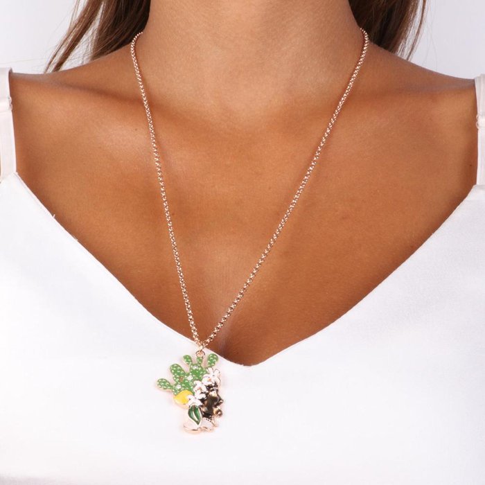 Metal necklace with Moor's head pendant with colored enamels and crystals