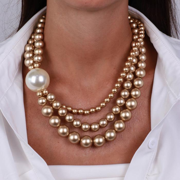 Multi-strand metal necklace with pearls