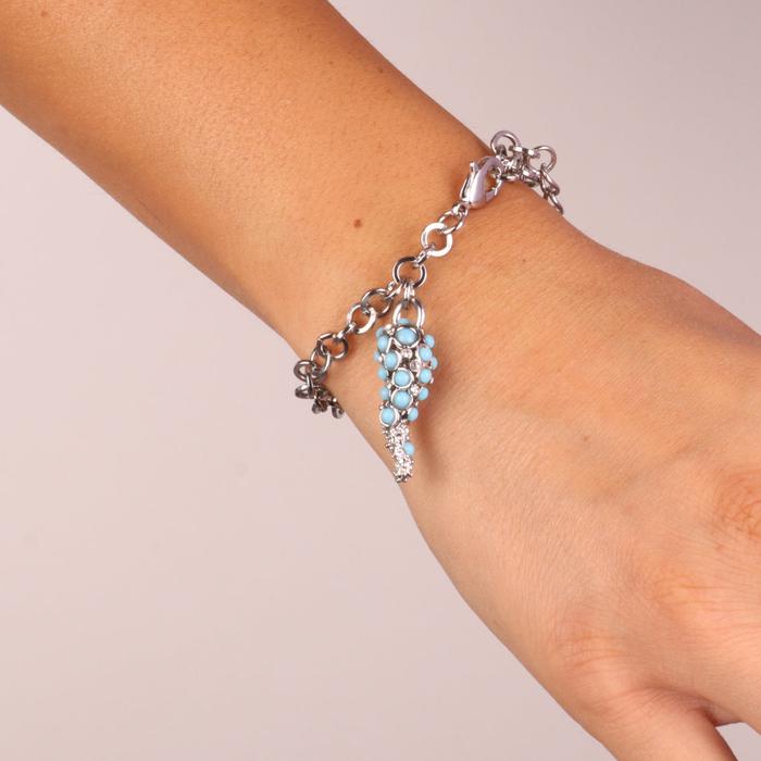 Metal bracelet with central horn and crystals