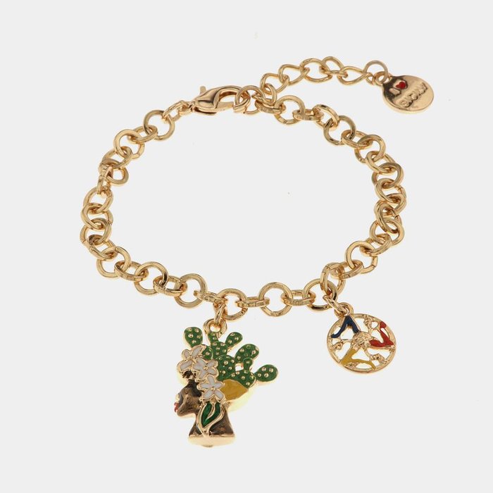 Bracelet en métal avec tête de femme maure et symbole Trinacria orné d'émaux colorés