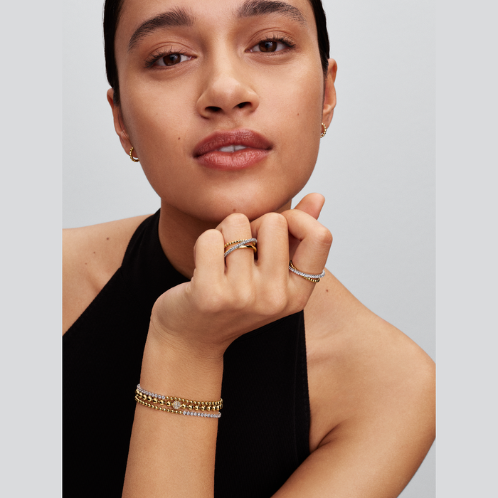 Anello Fascia Intrecciata Sfere e Pavé