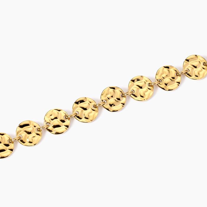 Bracciale dorato con tondi effetto martellato