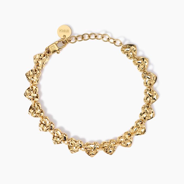 Bracciale dorato con cuori effetto martellato
