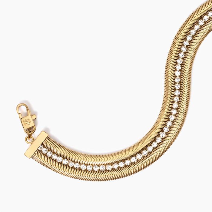 Golden bracelet with double chain and tennis