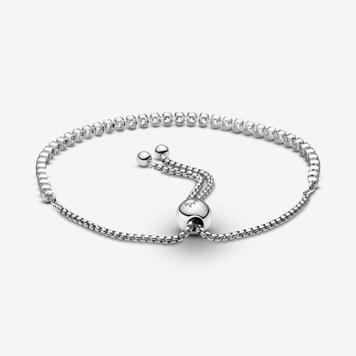 Tennis bracelet with adjustable clasp