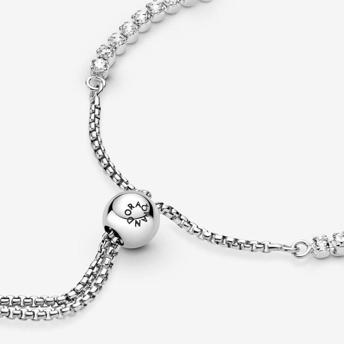 Tennis bracelet with adjustable clasp
