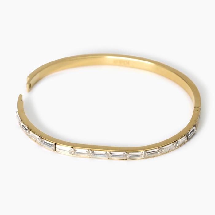 Bracciale rigido in acciaio dorato e zirconi