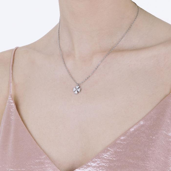 COLLIER FEMME EN ACIER AVEC TRÈFLE À QUATRE FEUILLES ET CRISTAUX BLANCS