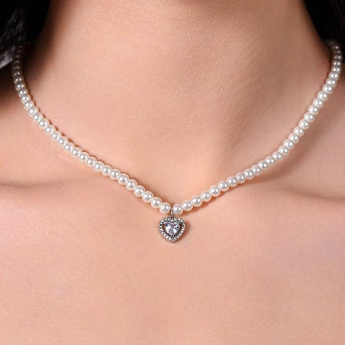 WOMEN'S NECKLACE IN STEEL WITH PEARLS AND HEART WITH WHITE ZIRCON