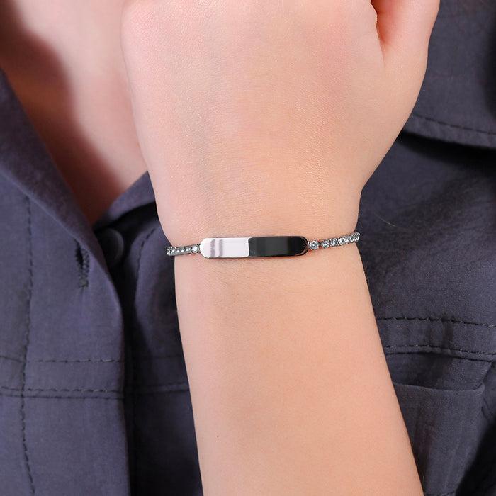 GIRL'S TENNIS BRACELET IN STEEL WITH WHITE CRYSTALS AND PLATE