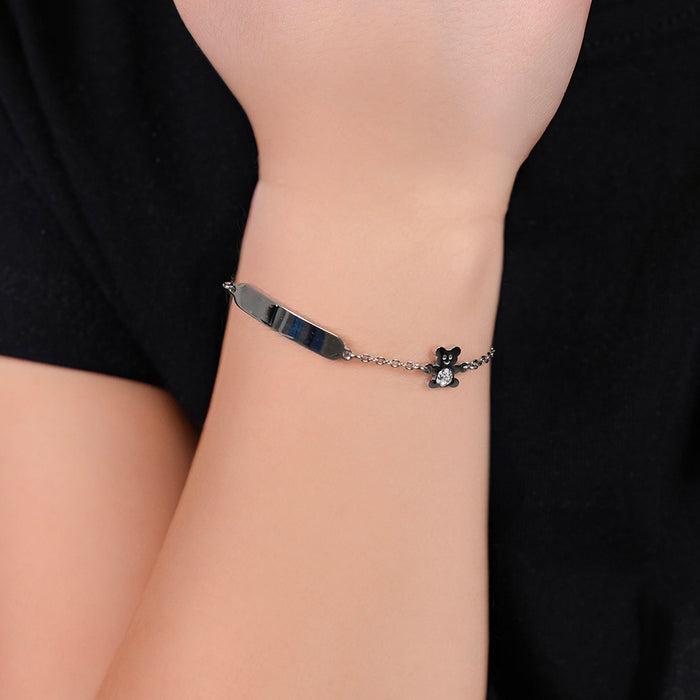GIRL'S BRACELET IN STEEL WITH PLATE AND TEDDY BEAR WITH WHITE CRYSTALS