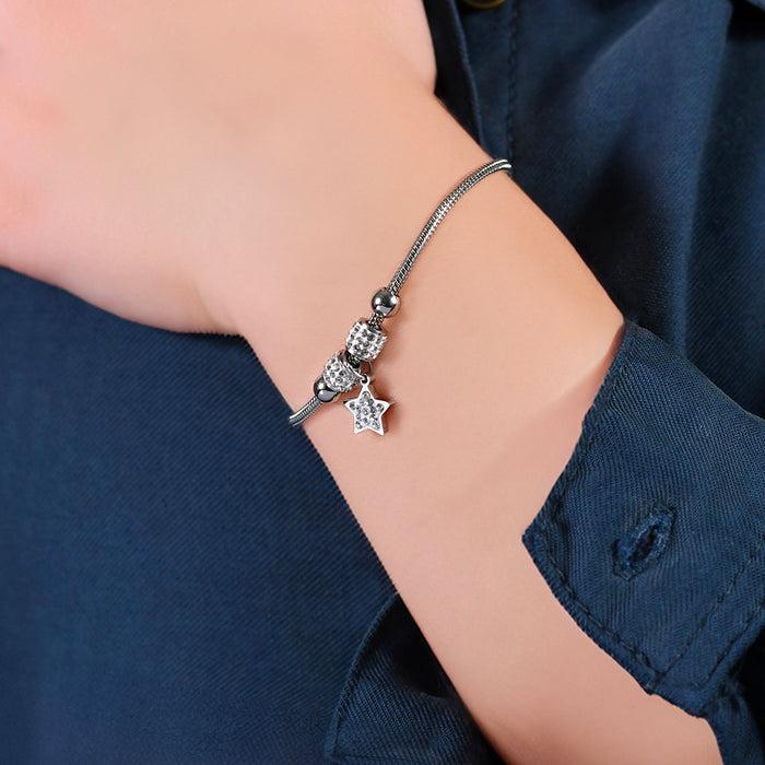 GIRL'S BRACELET IN STEEL WITH STAR WITH WHITE CRYSTALS
