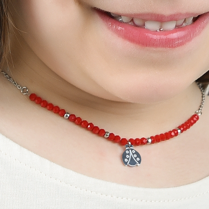 COLLIER FILLE EN ACIER AVEC PIERRES ROUGES ET COCCINELLE