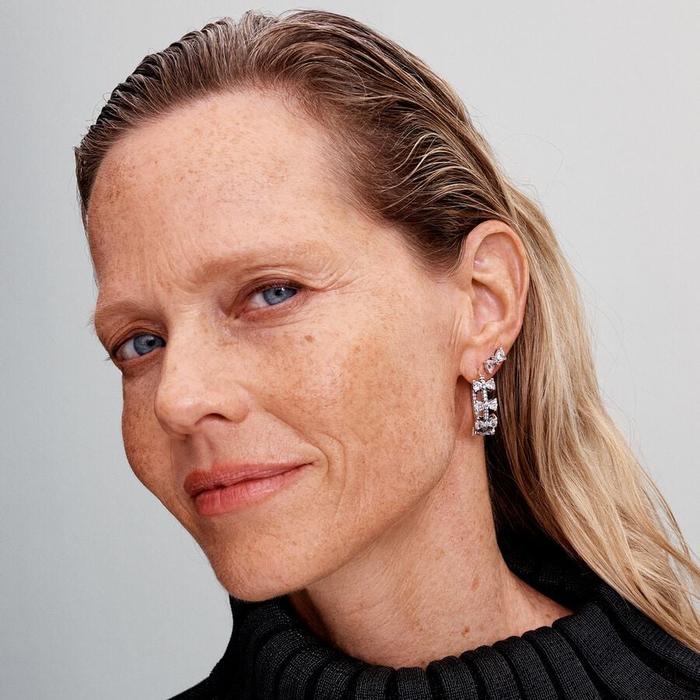 Boucles d'oreilles créoles avec nœuds brillants