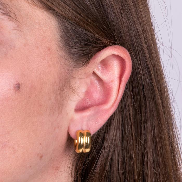 Boucles d'oreilles demi-cercle en acier avec courbure