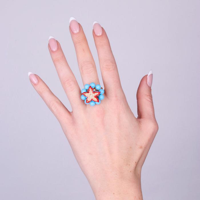 Anello in Metallo con sfere turchesi e stella marina rossa