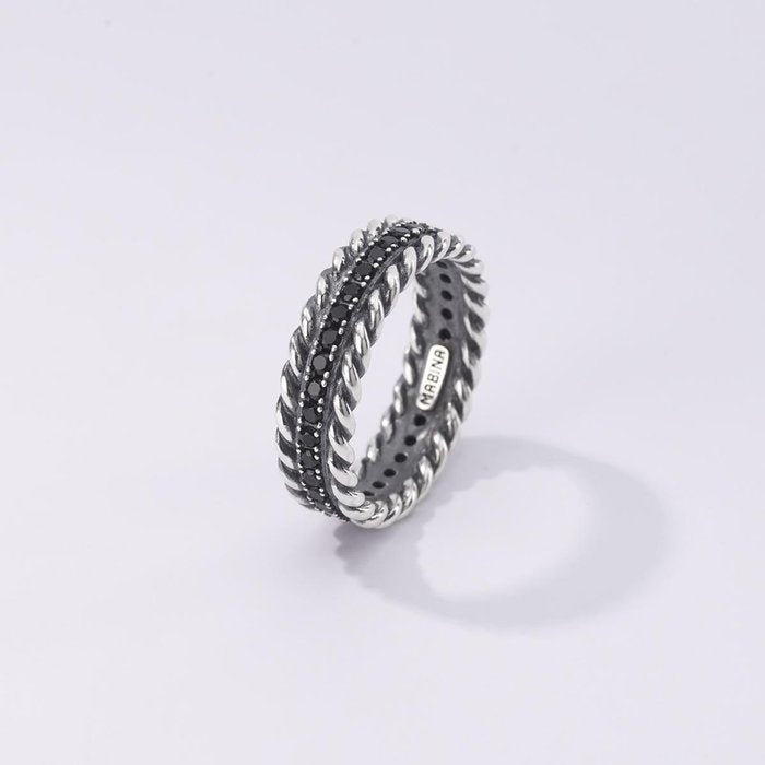 Torchon ring and black stones