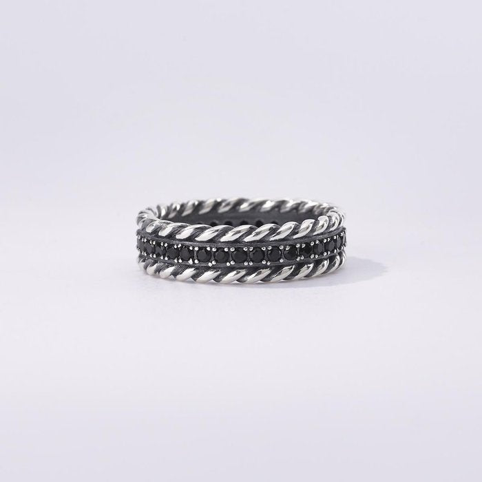 Torchon ring and black stones