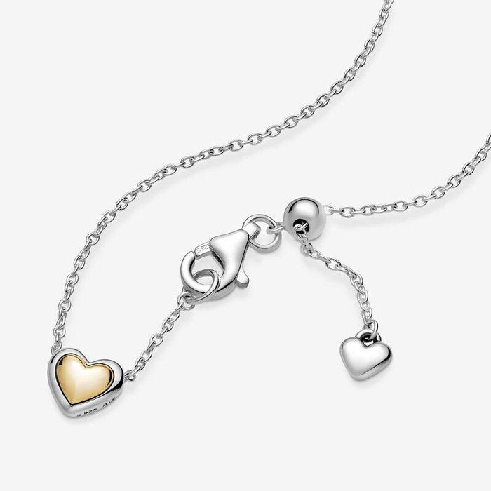 Collier con cuore dorato a cupola