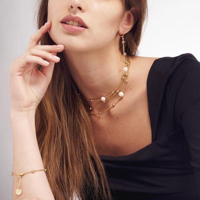 Collana in bronzo dorato e perle naturali