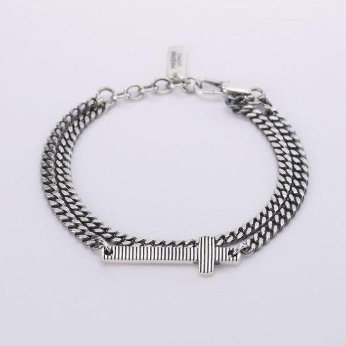 BRACELET GROUMETTE MULTICHAÎNES AVEC CROIX RAYÉE