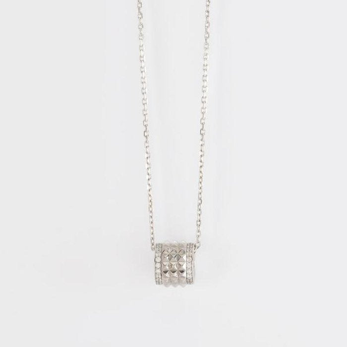 COLLIER AVEC CLOUS CYLINDRIQUES ET ZIRCONE