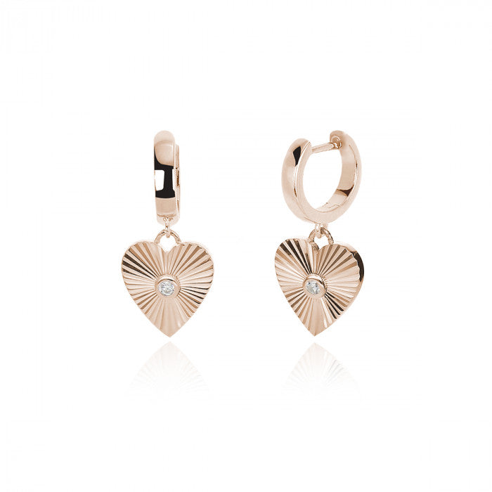 BOUCLES D'OREILLES COEUR AVEC RAYONS DE LUMIÈRE