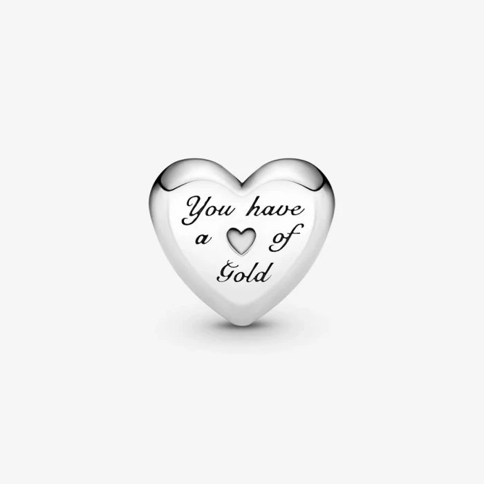 Charm con cuore dorato a cupola