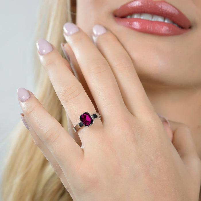 WOMEN'S RING IN STEEL WITH FUCHSIA CRYSTALS