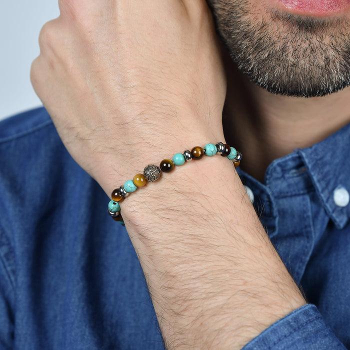 BRACCIALE UOMO ELASTICO CON PIETRE TURCHESI ED OCCHIO DI TIGRE ED ELEMENTI