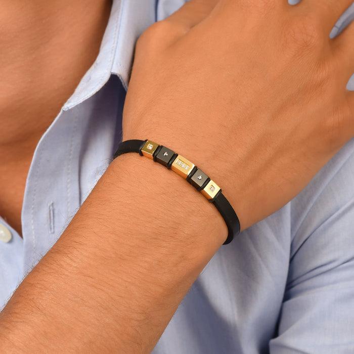 BRACELET HOMME EN SILICONE NOIR AVEC ÉLÉMENTS EN OR IP ET EN ACIER NOIR IP