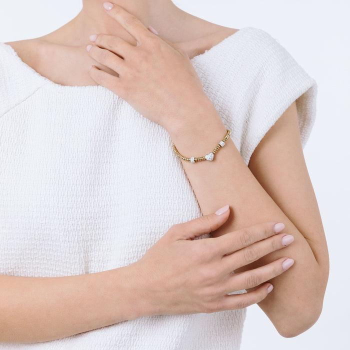 Bracelet en acier doré IP avec cœur et cristaux blancs