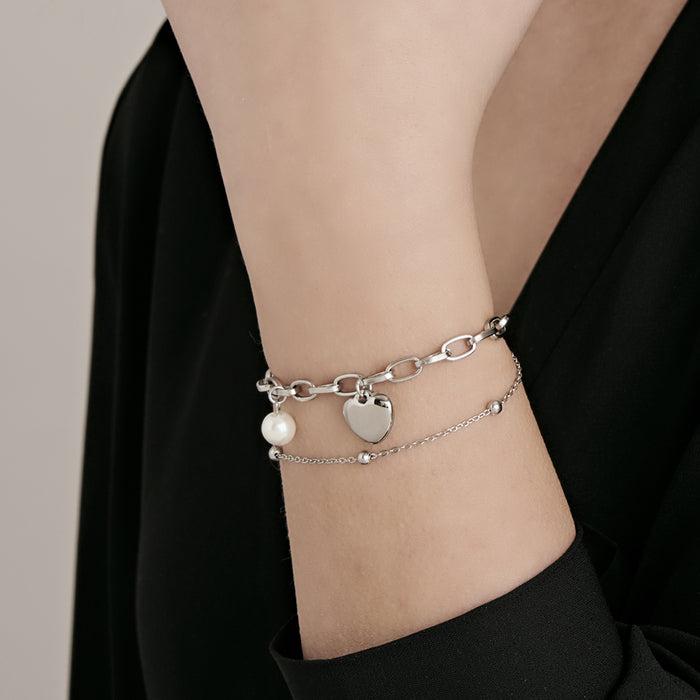 BRACELET FEMME EN ACIER DORÉ IP AVEC COEUR ET PERLES