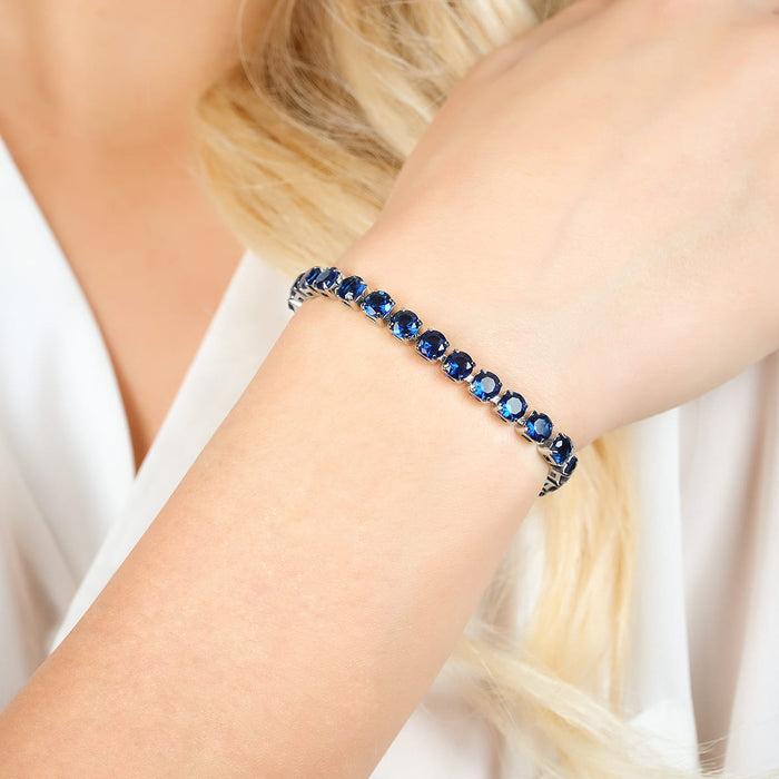 BRACCIALE TENNIS DONNA IN ACCIAIO CON CRISTALLI BLU