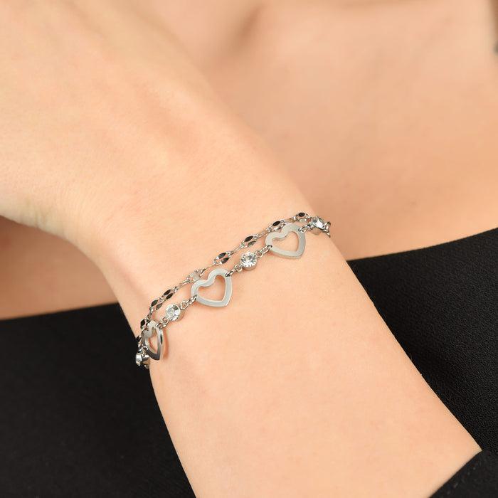 BRACCIALE DONNA MULTIFILO IN ACCIAIO CON CUORI TRAFORATI E CRISTALLI BIANCHI
