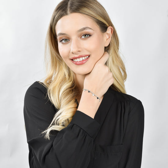 BRACCIALE DONNA IN ACCIAIO CON CRISTALLI BIANCHI E CUORI