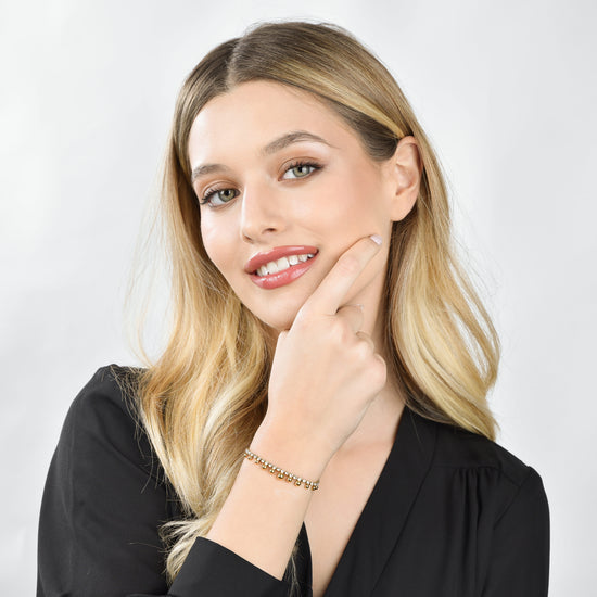 BRACCIALE DONNA IN ACCIAIO IP GOLD CON CRISTALLI BIANCHI E SFERE