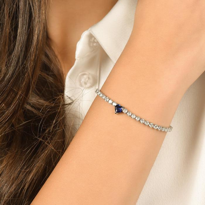 BRACELET TENNIS FEMME EN ACIER AVEC CRISTAUX BLANCS ET CŒUR EN CRISTAL BLEU
