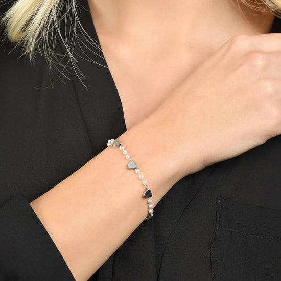 BRACCIALE DONNA IN ACCIAIO CON PERLE BIANCHE E CUORI