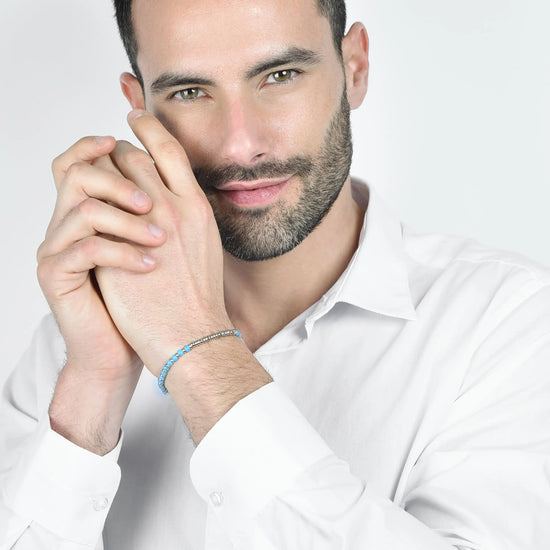 BRACCIALE UOMO IN ACCIAIO CON PIETRE AZZURRE E SFERE IN ACCIAIO