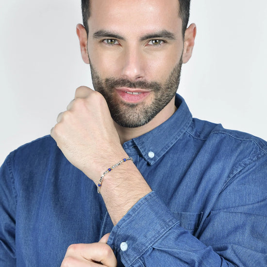 MEN'S BRACELET IN STEEL WITH BLUE STONES AND IP GOLD ELEMENTS