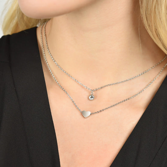 WOMEN'S MULTI-STRAIN STEEL NECKLACE WITH HEART AND WHITE CRYSTAL