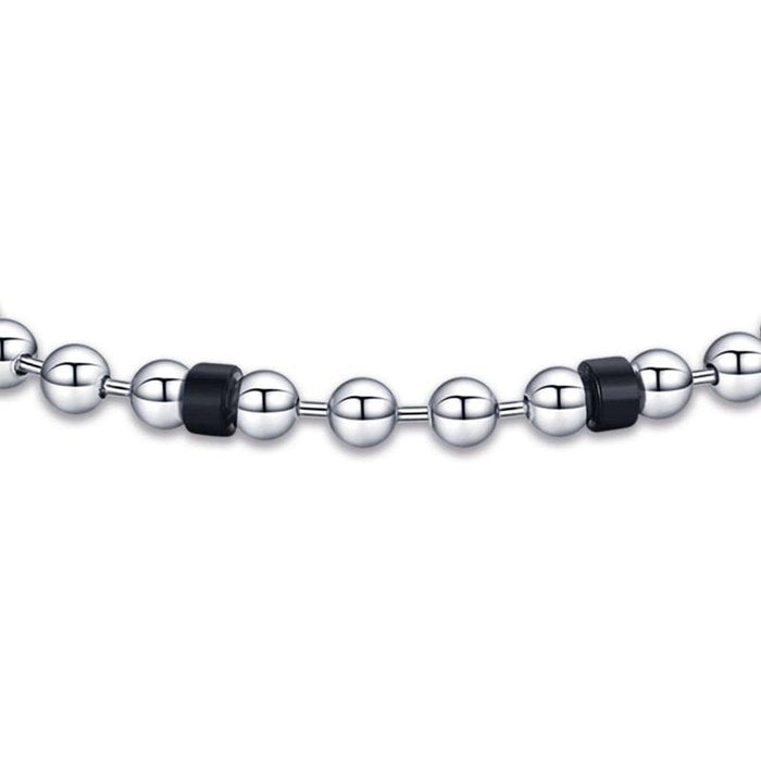 Bracciale in acciaio con elementi neri