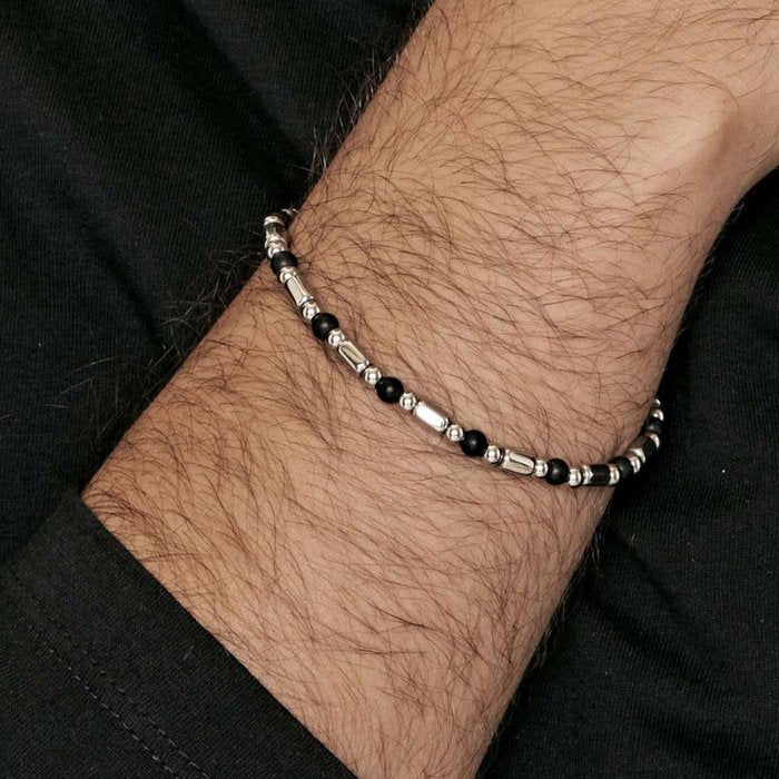 Bracciale in acciaio con elementi neri
