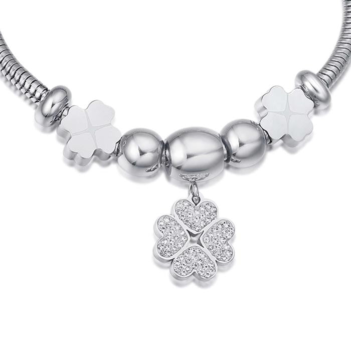 Bracelet en acier avec trèfle à quatre feuilles et cristaux blancs